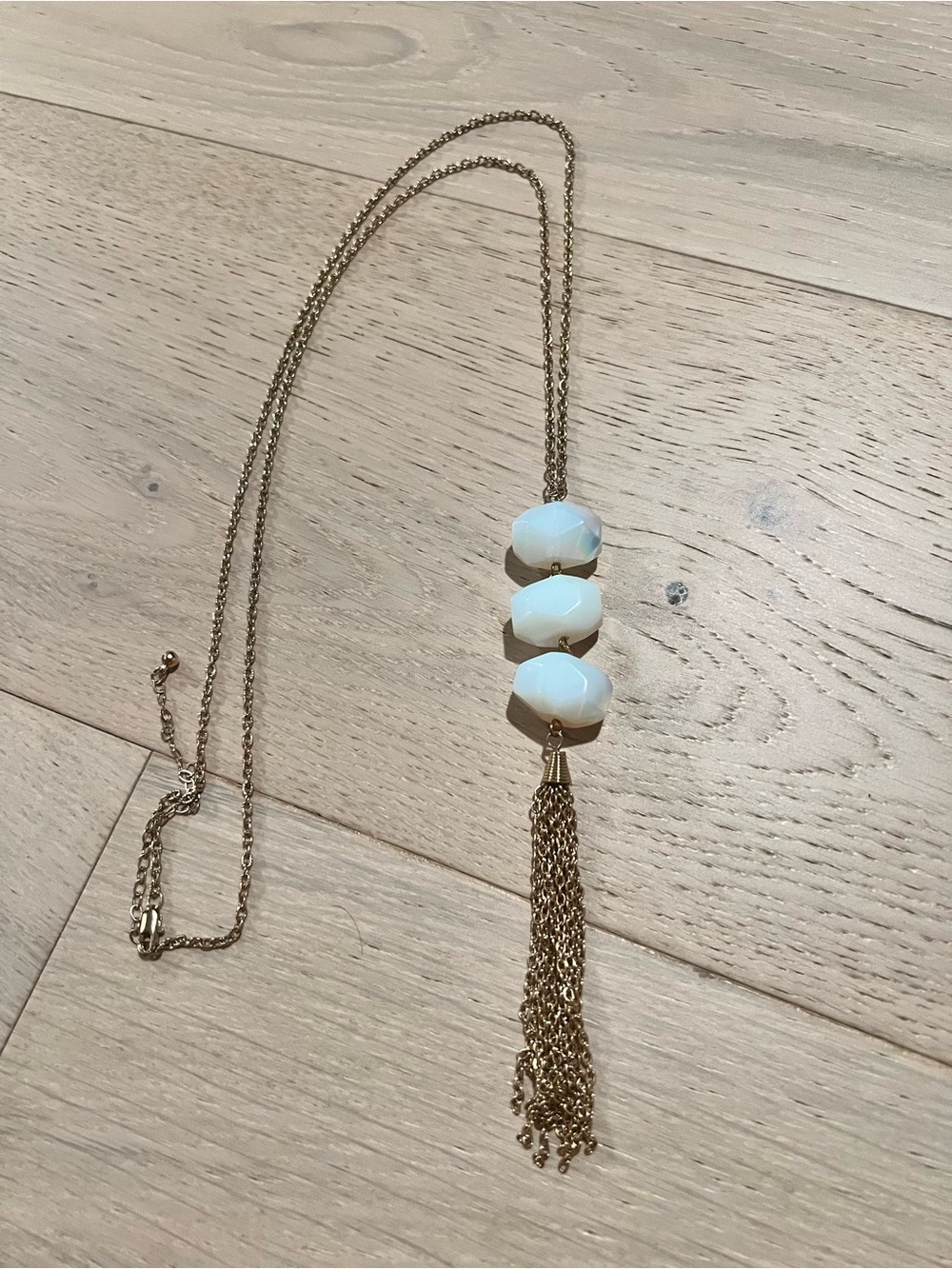 Gold-Tone Tassel Necklace with White Faceted Beads